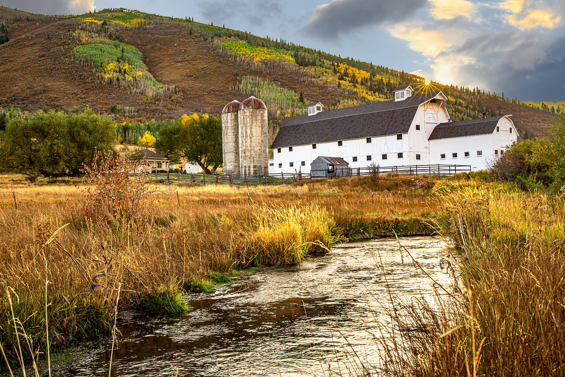 The McPolin Barn near park City Utah at sunset - Copyright Randy G. Barney Photography