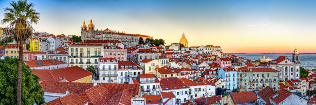 An awe inspiring view at sunset over the old town Alfama in Lisbon Portugal - Copyright Randy G Barney Photography.